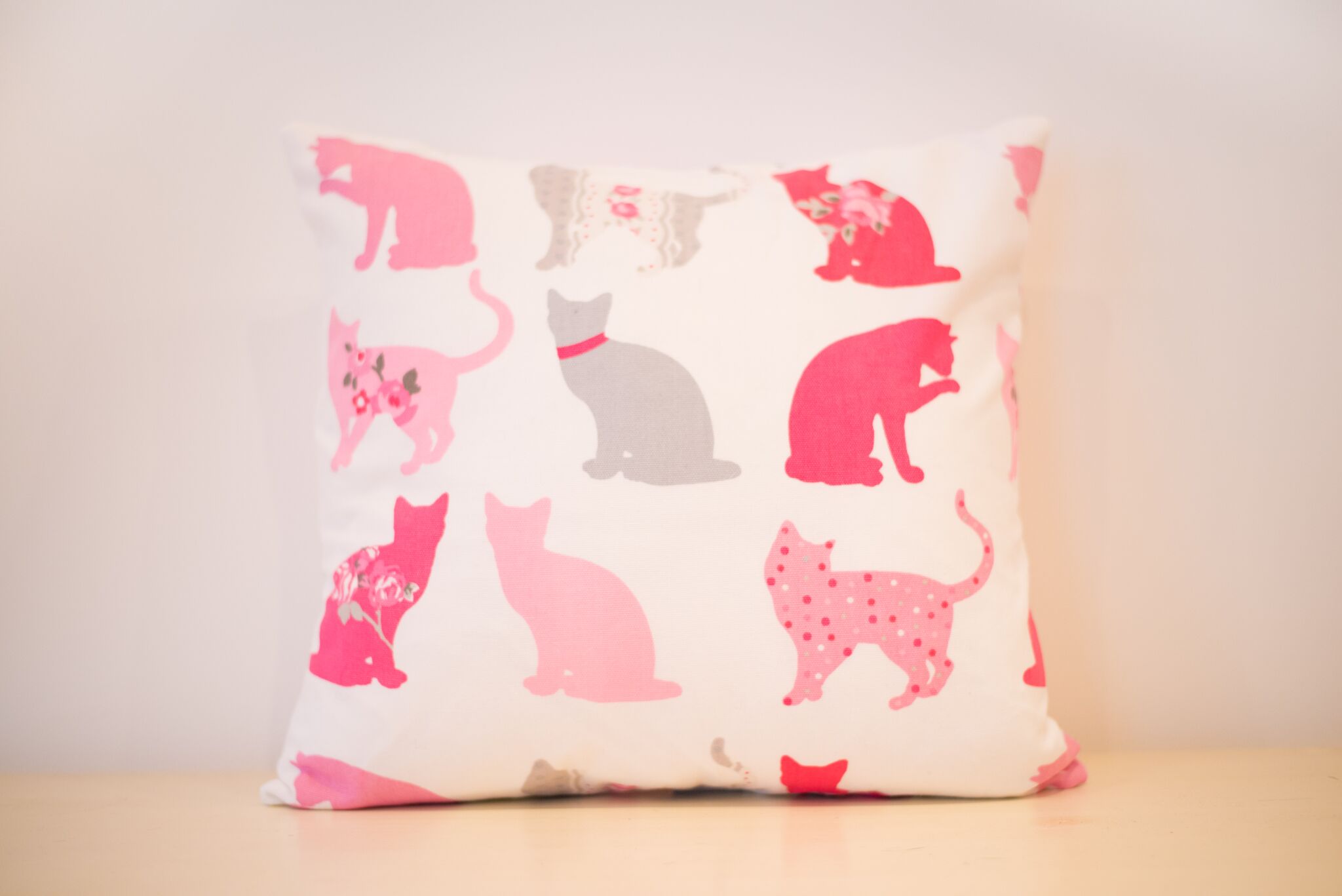Pink and grey cat cushion